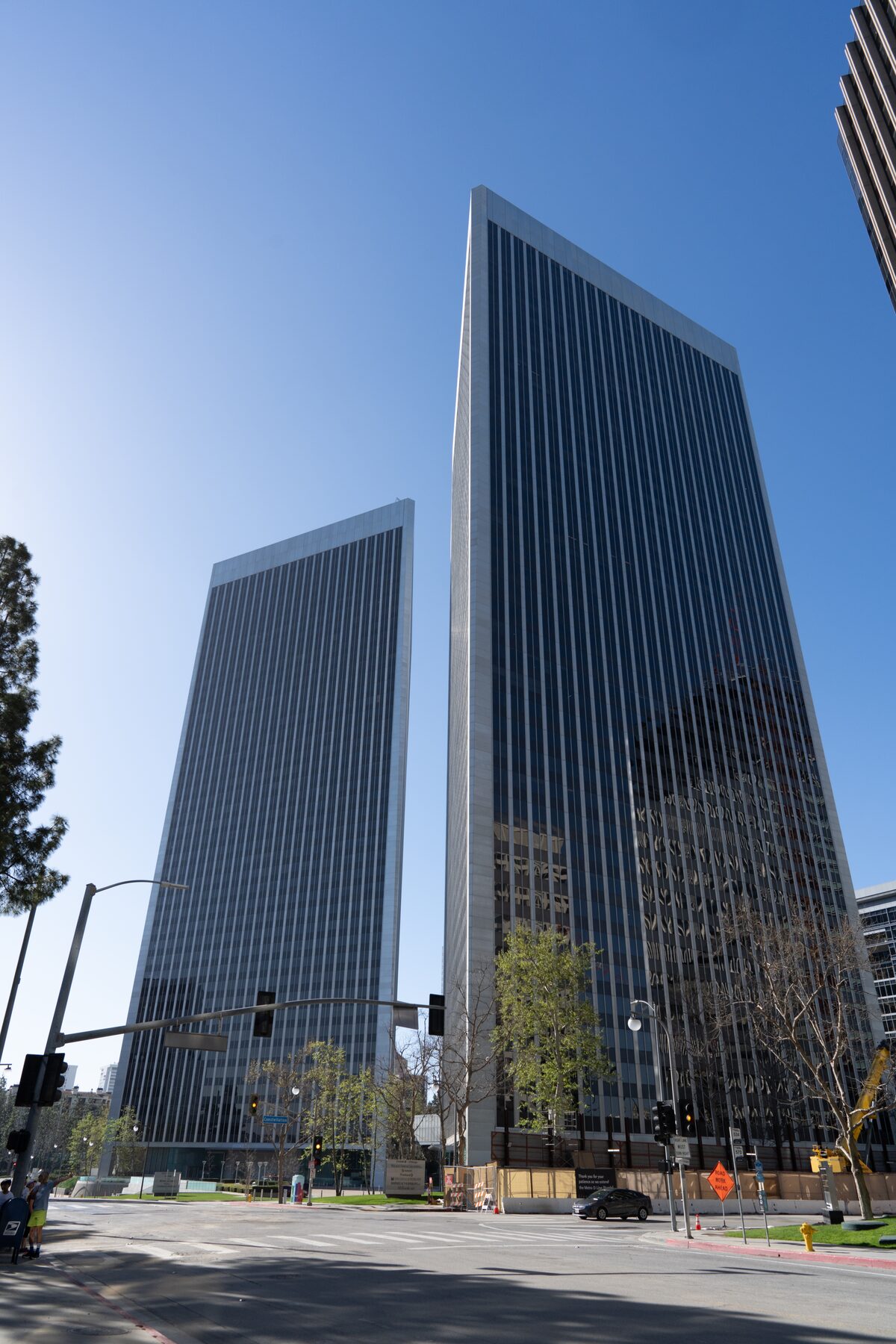 Century Plaza Towers seen from a street intersection, glazing uniform across both elevations